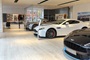 Aston Martin cars inside the Wilmslow showroom.