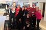 Employees wearing Christmas jumpers for Save the Children.