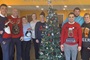 Colleagues wearing Christmas jumpers.